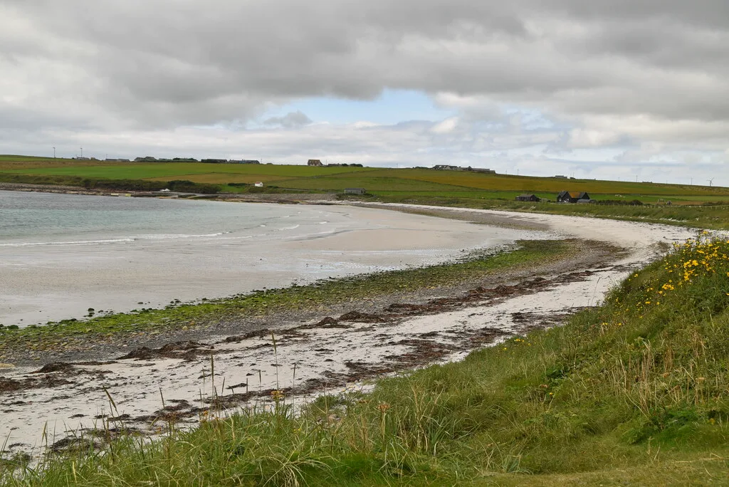The quiet crescent of sand at Newark Bay, Deerness, on the sheltered south-east coast of Orkney Mainland