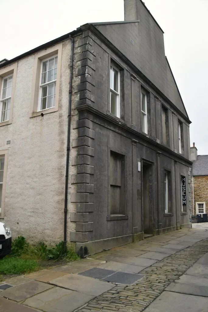 Stromness Museum at 52 Alfred Street, Stromness — a stone-built town house on the narrow flagstone street through the old town