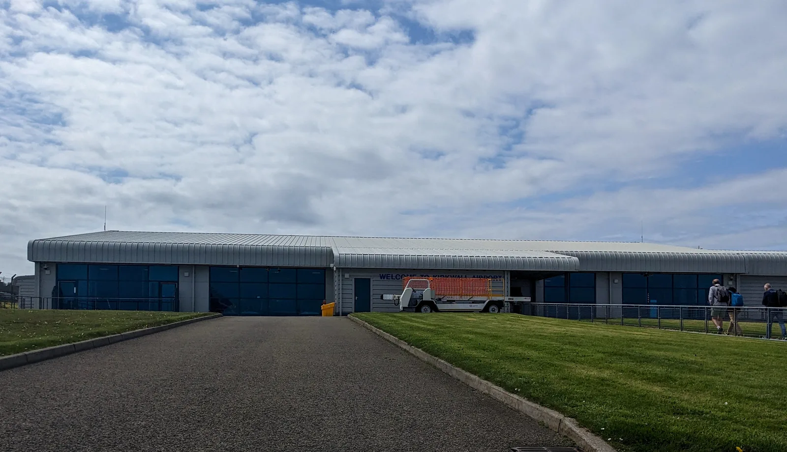 The terminal building at Kirkwall Airport, Orkney, under a cloudy sky