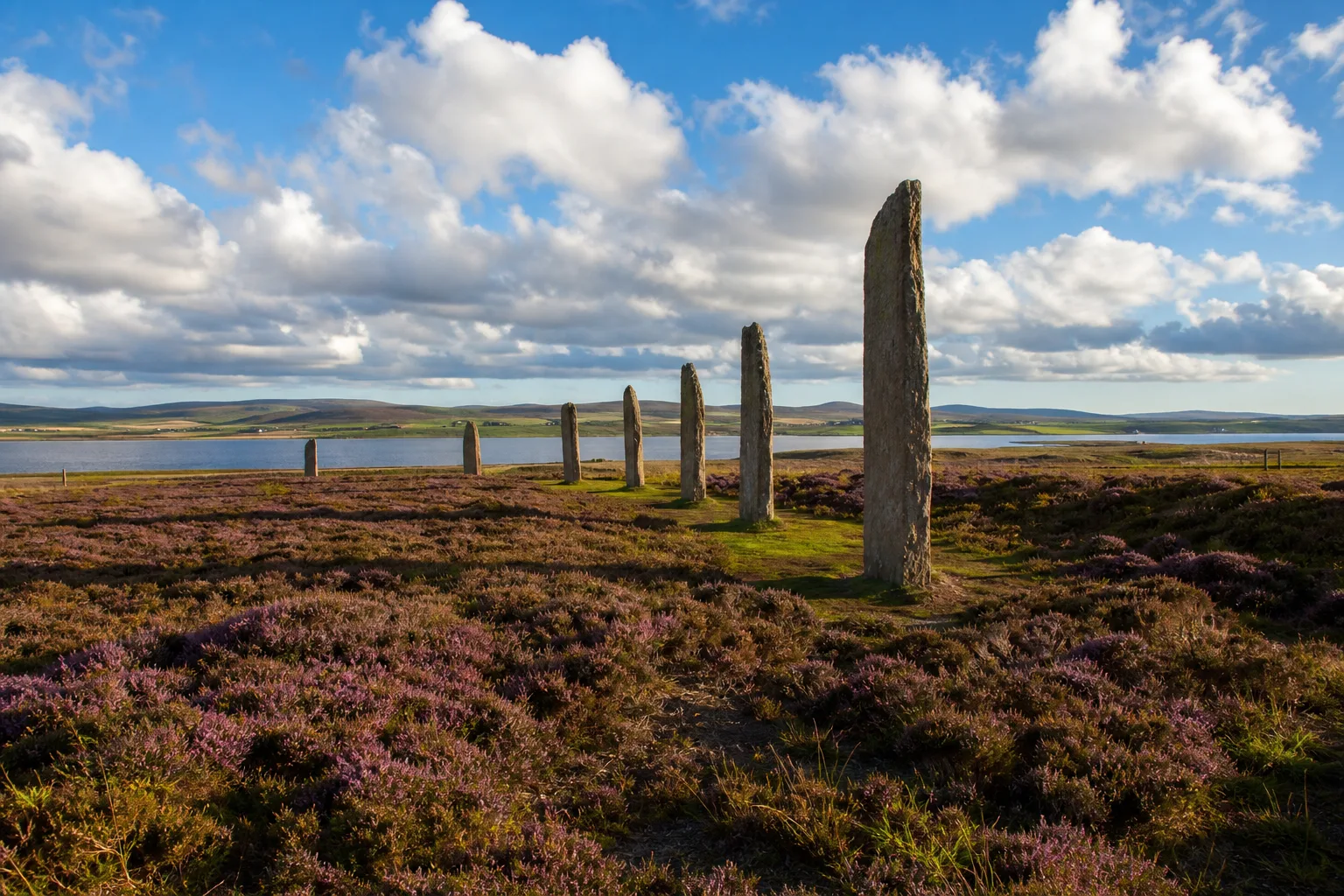 Standing stones of the Ring of Brodgar on Orkney Mainland under a bright summer sky