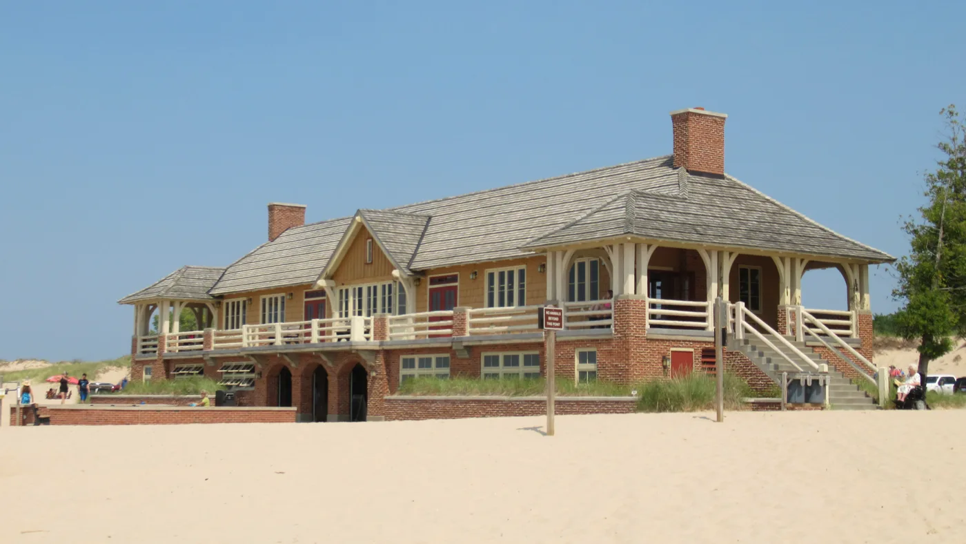 Historic Lake Michigan Beach House at Ludington State Park on wide sandy beach
