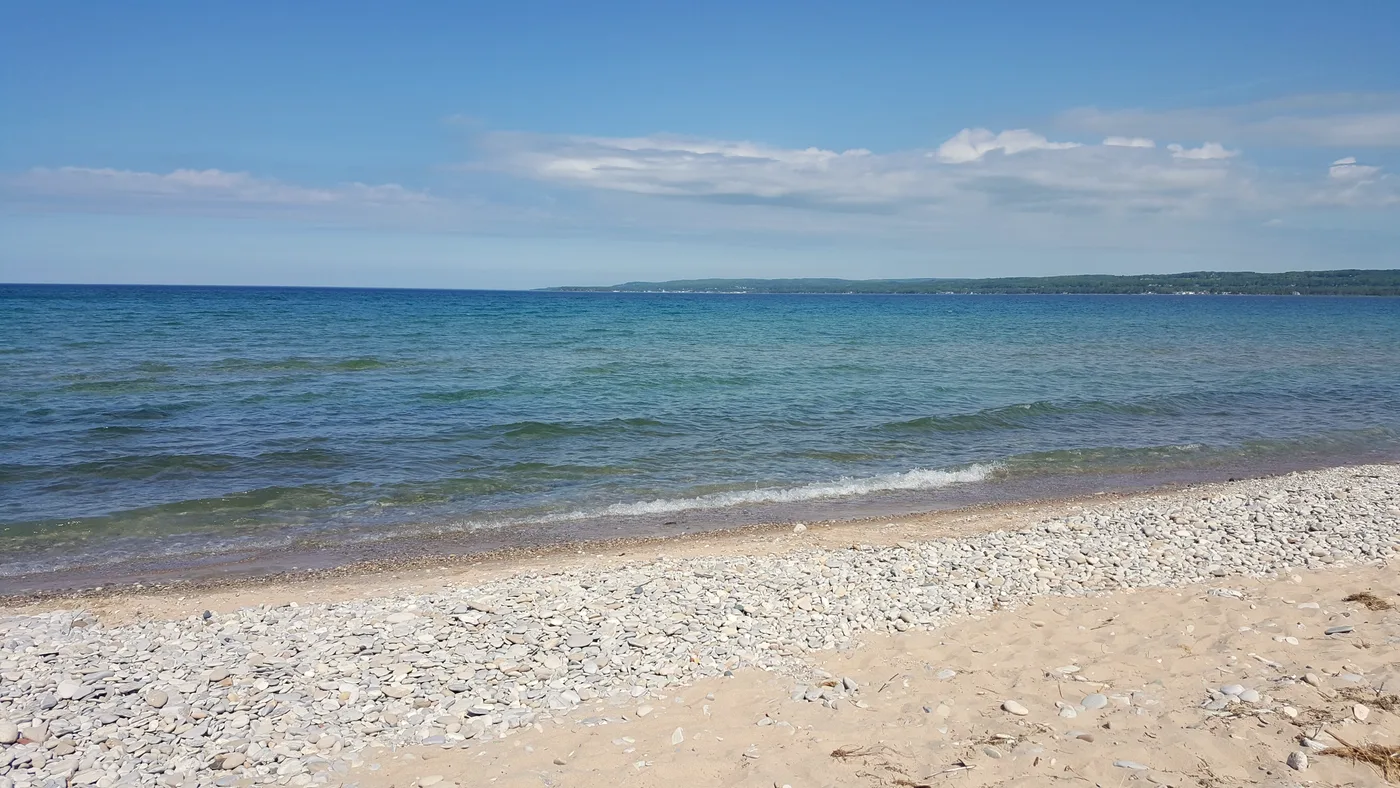 Sandy and pebble beach at Petoskey State Park on Little Traverse Bay, Lake Michigan