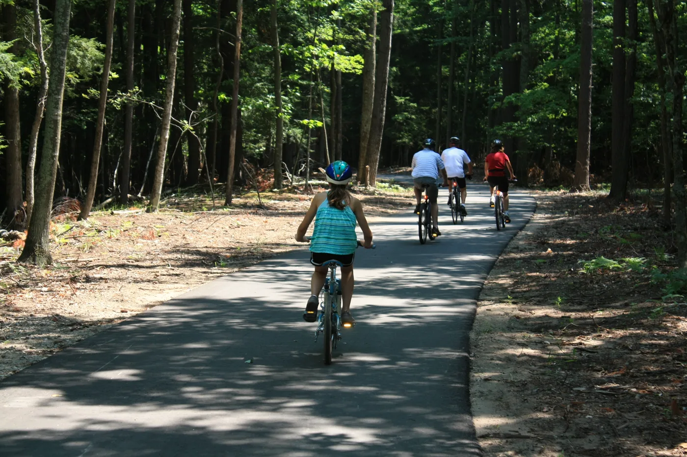 Cyclists on the paved Sleeping Bear Heritage Trail through Sleeping Bear Dunes National Lakeshore, Michigan