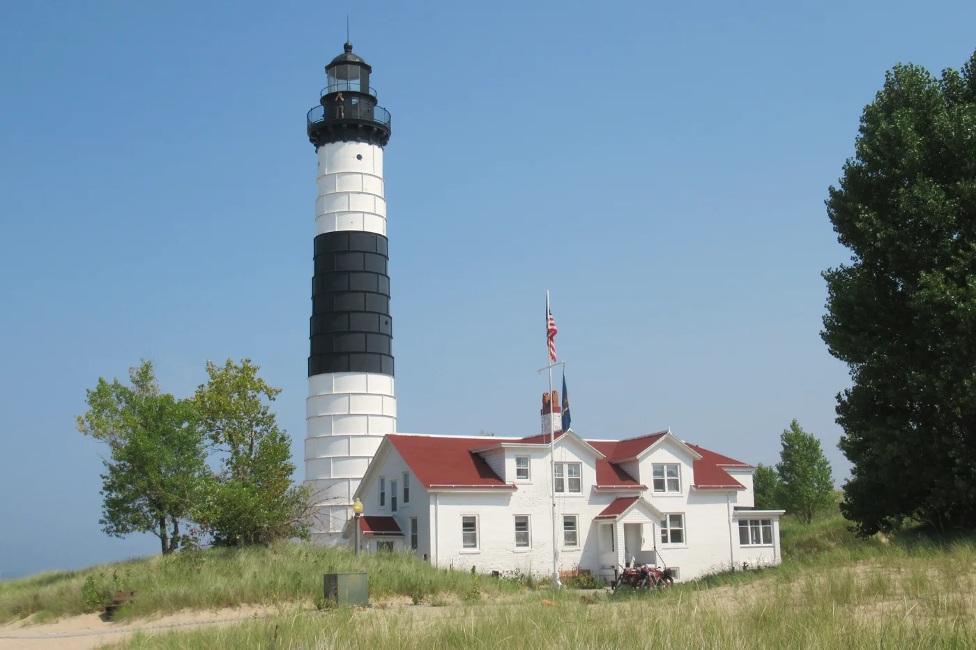 Big Sable Point Lighthouse rising above the Lake Michigan shoreline inside Ludington State Park, Michigan
