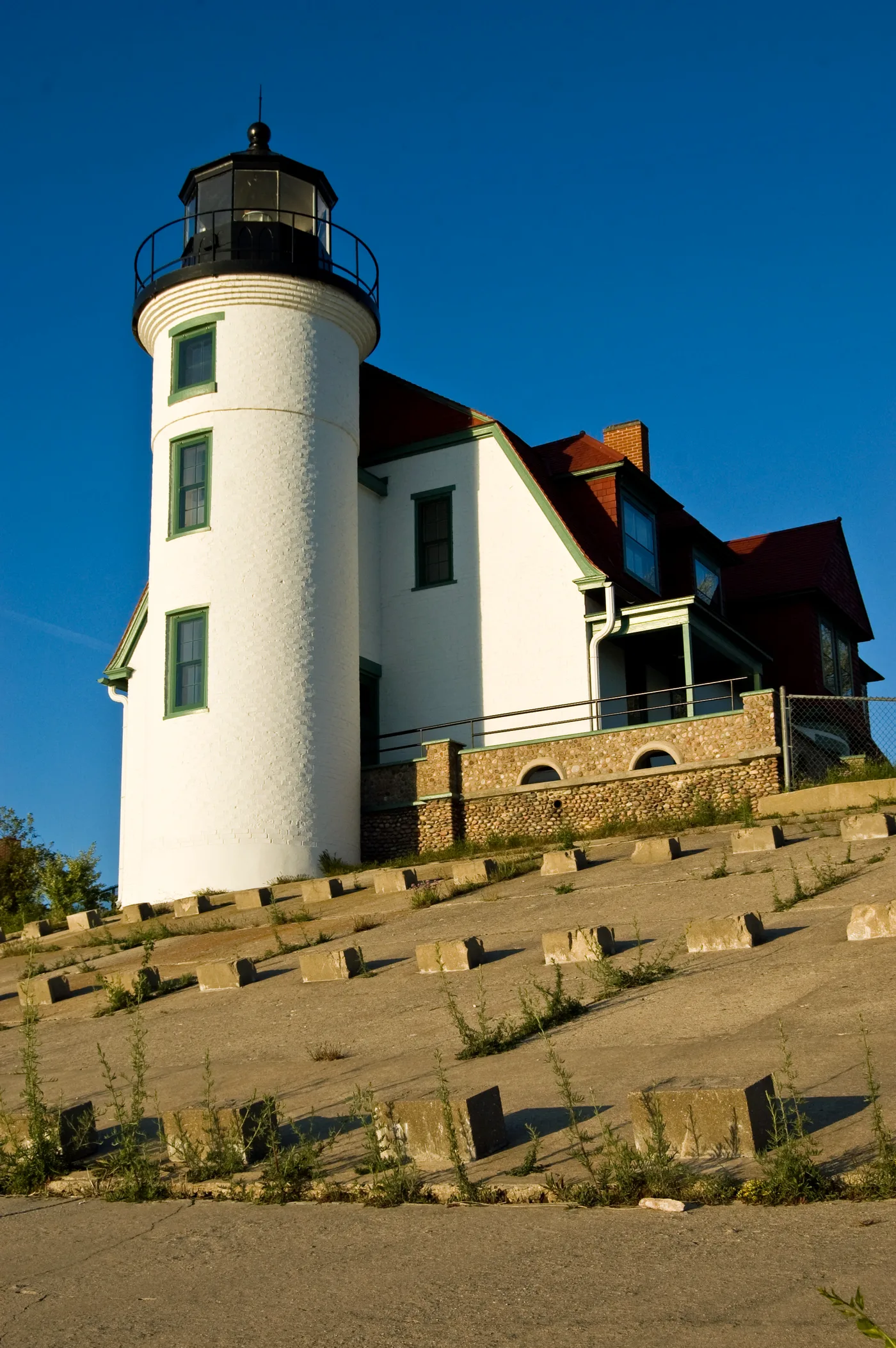 Point Betsie Lighthouse white tower and red-roofed keeper's quarters on the Lake Michigan shoreline north of Frankfort, Michigan