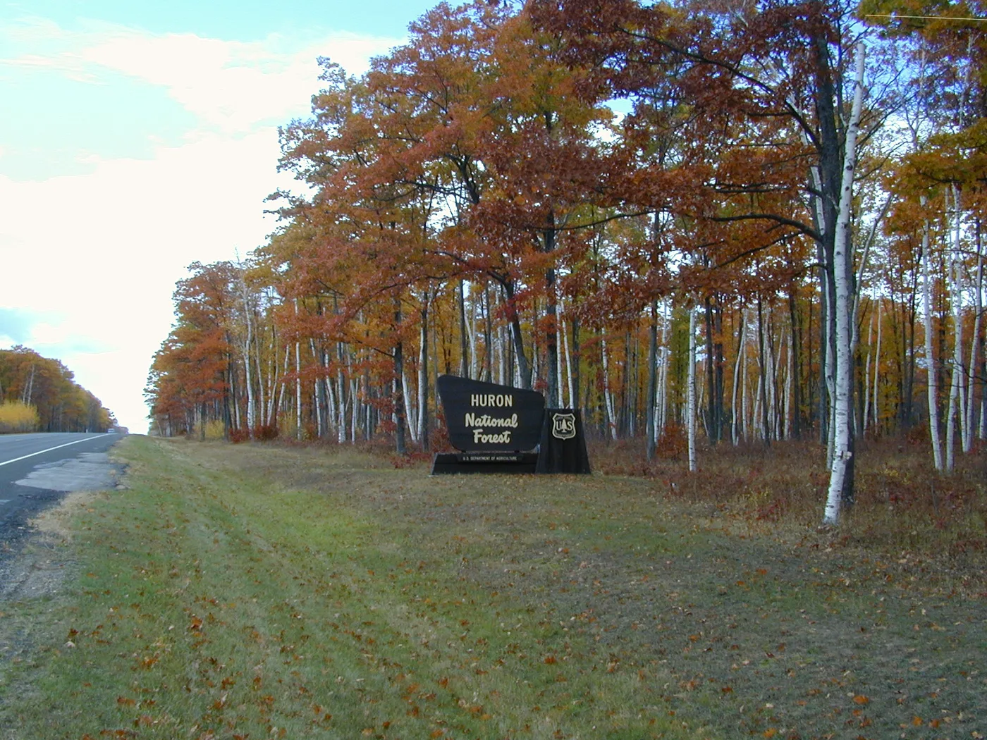 Entrance road into the Huron National Forest along the River Road Scenic Byway in Michigan
