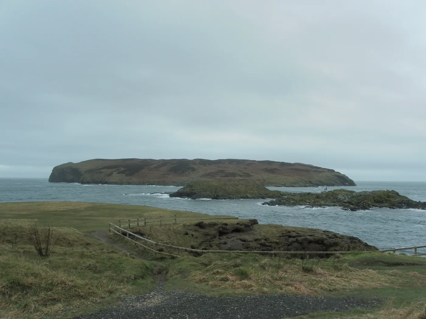The narrow strait of Calf Sound with the Calf of Man beyond and rocky islets in the tide race