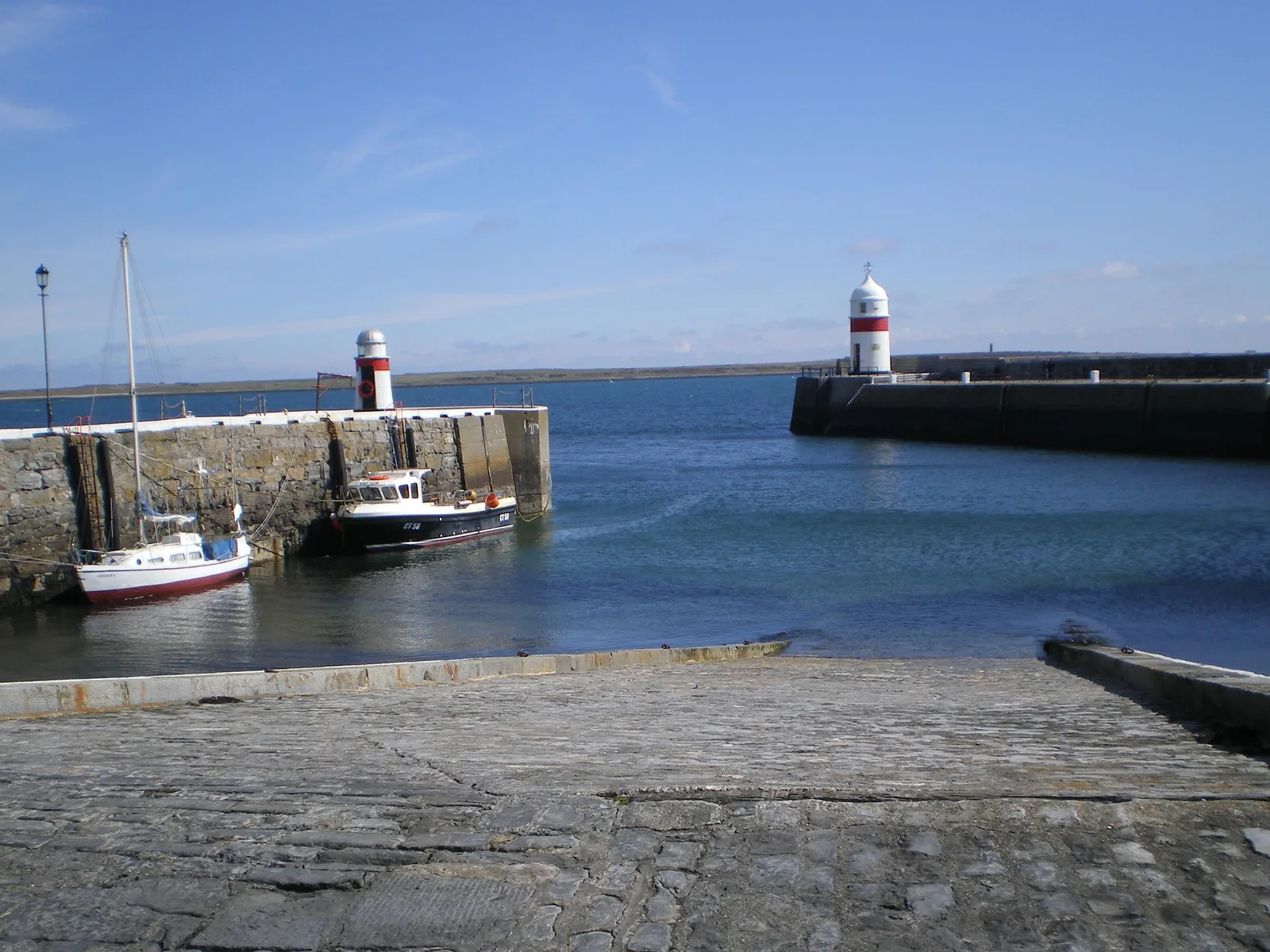Boats and quayside buildings in Castletown harbour on the south of the Isle of Man