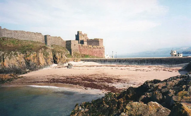 Fenella Beach and the causeway carrying the road from Peel's East Quay out to St Patrick's Isle