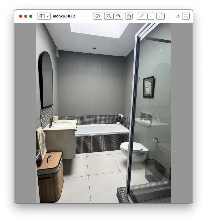 Bathroom with a built-in tub, separate glass shower cubicle and single vanity
