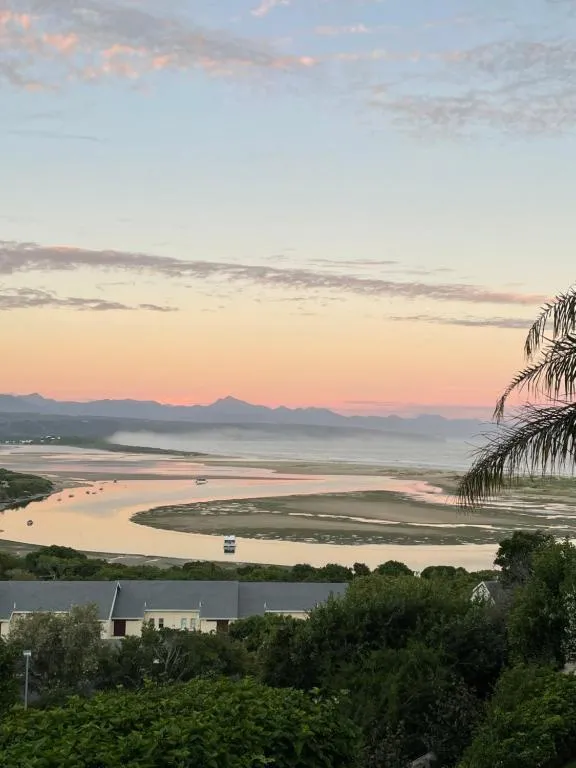 View from the property over the Keurbooms lagoon and sandbanks to the mountains at sunset