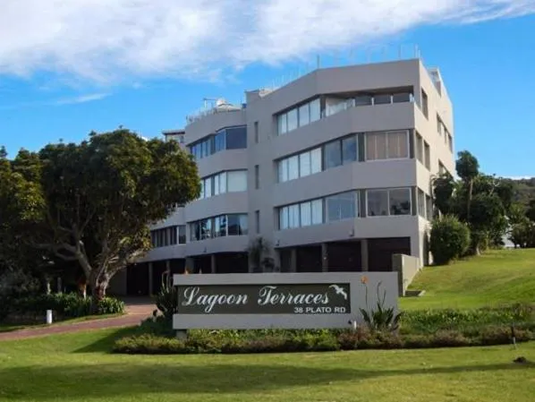 Exterior of the Lagoon Terraces apartment building with its entrance sign and lawned frontage