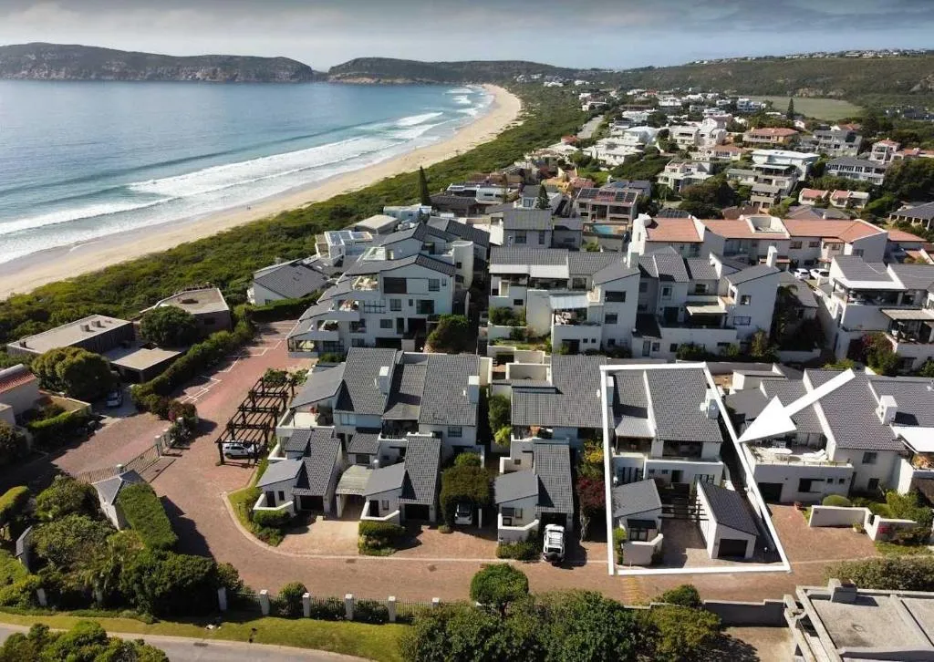 Aerial view of the property within a beachfront estate metres from Robberg Beach and the ocean